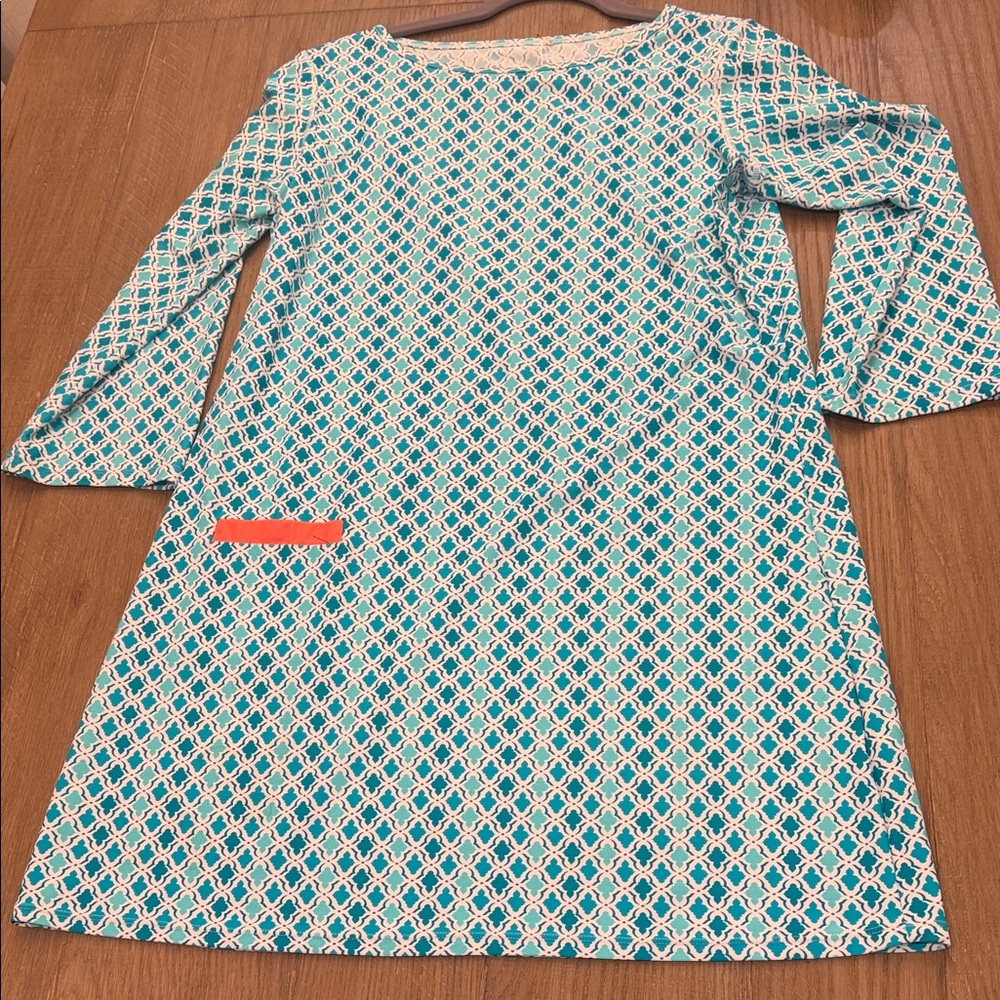 Geometric Patterned Dress with Orange Accent